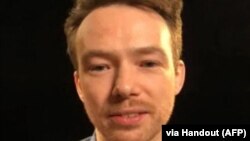 اسکرینشات از تماس تصویری یوهان فلودروس از زندان اوین که خانوادهاش در اختیار خبرگزاری فرانسه قرار دادند