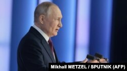 Российский президент Владимир Путин во время выступления с посланием к Федеральному собранию РФ. Москва, 21 февраля 2023 года