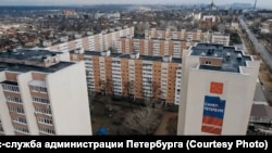 Newly reconstructed apartment blocks in Mariupol
-- Residents, and even some workers, say the quality of the effort is questionable.