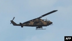 د پاکستان پوځي ګن شپ هیلي کاپټر په خیبر پښتونخوا کې د طالبانو پر ضد عملیاتو کې برخه اخلي ـ پخوانی انځور.