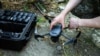 A Ukrainian soldier in Kherson prepares to operate a commercial DJI Mavic drone in June.