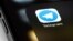 Telegram mobile icon app on screen smartphone iPhone macro. Telegram - cross-platform messenger. Moscow, Russia - June 15, 2021