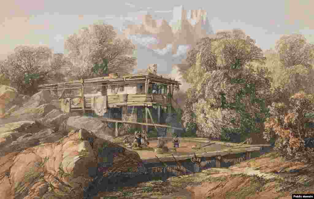 Кримськотатарська хата в селі Алупка. За словами Боссолі, такі сільські будинки часто будували на скелястих виступах, які слугували однією стіною для житла. «Дах плаский, зазвичай, коли гарна погода, на ньому збираються мешканці, щоб попрацювати або насолодитися товариством один з одним», – писав художник  