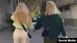 "Our girls are fighting and know that there is no way back for us and we are not going back, and our answer to them wanting to forcibly put a hijab on us is, 'No!'" one women's rights activist in Tehran said.