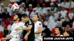 Лаҳзае аз бозии 28 январ. Тоҷикистон дар муқобили Иморот