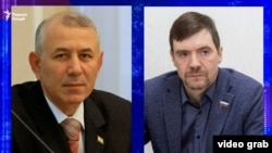 Минҳоҷиддин Каримов, раҳбари Созмони фарҳангии тоҷикон ва Ростислав Антонов, вакили рус дар Новосибирск