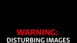 Video Shows Mob Beating Afghan Woman Video Shows Mob Beating Afghan Woman