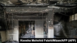Eight prisoners were killed in the blaze, which officials said was caused during a fight between inmates. However, activists are skeptical of the government's claims.