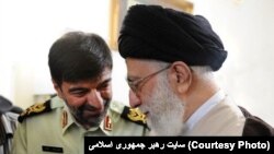 احمدرضا رادان (چپ) در کنار علی خامنهای