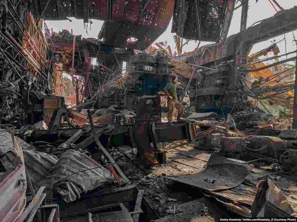 A Ukrainian soldier is seen within the Azovstal Iron and Steel Works complex in Mariupol. The last soldiers in Mariupol surrendered to Russia's forces on May 16 and have been held prisoner in territory controlled by the separatists in eastern Ukraine.