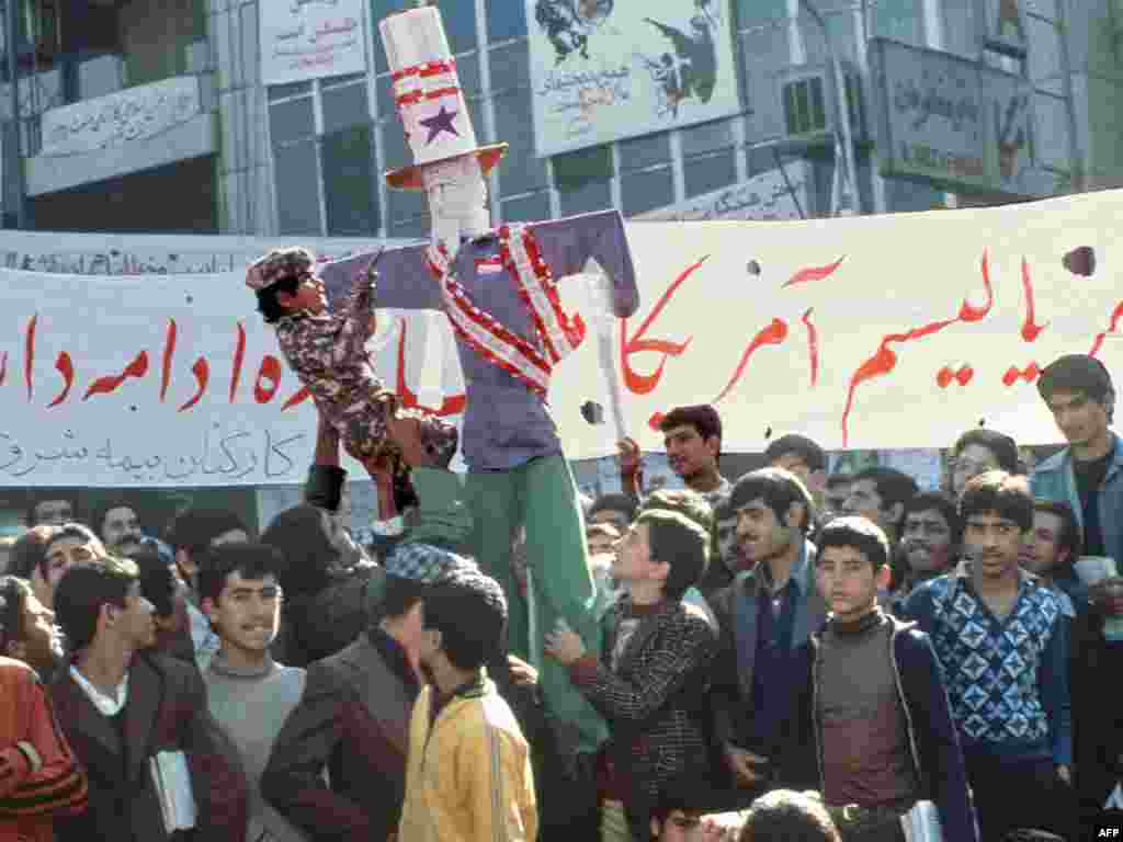 An effigy of then-U.S. President Jimmy Carter is carried outside the embassy on November 18, 1979. Carter froze Iranian assets in the United States and cut diplomatic ties with Iran.