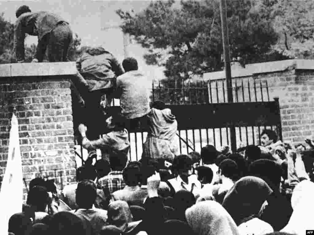 The final seizure of the U.S. Embassy in Tehran began on November 4, 1979, when some 400 radical Iranian students stormed through the gates and climbed over the walls. The students demanded that the Shah of Iran be extradited from the United States, where he had fled to receive medical treatment. The shah had expelled Khomeini in 1964.
