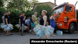 Очередь за водой в оккупированном Донецке, июль 2025 года