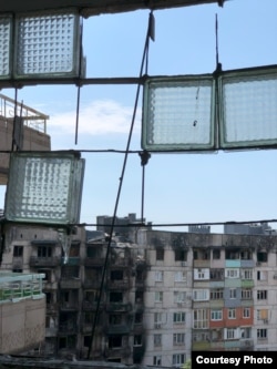 Щоб врятуватися, люди стрибали з палаючих будинків. Фото надане анонімно місцевою жителькою