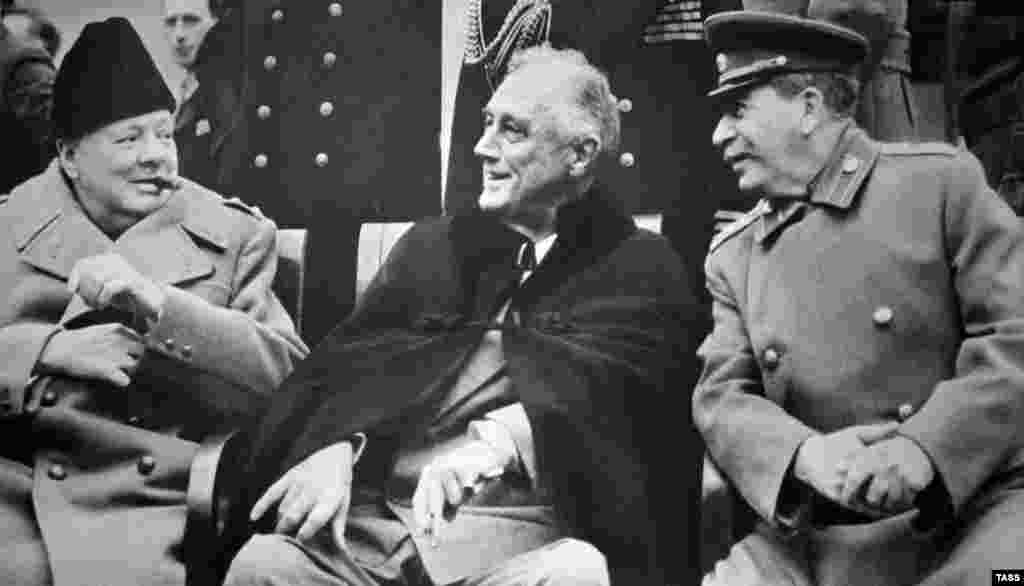 In February 1945, the leaders of the three main Allied powers met at a former tsarist palace outside the Crimean town of Yalta to discuss the final stages of the war against Germany and Japan and the postwar order. The meeting resulted in such key decisions as the agreement to accept only the unconditional surrender of Germany and to divide the country and the city of Berlin into four occupation zones. The Allies agreed to German reparations, including the use of forced labor. The Allies agreed to hand over to the Soviets all Soviet citizens regardless of their wishes. Stalin agreed to join the United Nations and to allow free elections in Poland. He also agreed that the Soviet Union would enter the war against Japan within 90 days after Germany's defeat. (British Prime Minister Winston Churchill (left), U.S. President Franklin Roosevelt (center), and Soviet leader Josef Stalin at the Yalta Conference in February 1945)