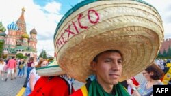 A Mexico soccer fan walks on Red Square in Moscow on June 21.