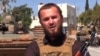 'Dead' Kosovar Albanian IS Militant Resurfaces In Gruesome Killing Video