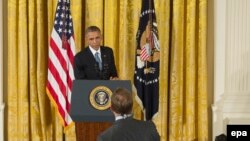 Президент США Барак Обама отвечает на вопрос журналиста на пресс-конференции