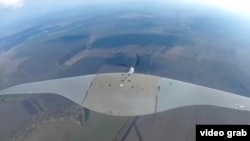 Російський розвідувальний безпілотник Supercam за декілька секунд до перехоплення українським дроном