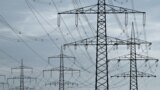 FILE PHOTO: Electrical power pylons near Luettow-Valluhn in Germany