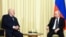 Russian President Vladimir Putin (right) meets with Belarusian leader Alyaksandr Lukashenka outside Moscow in February.