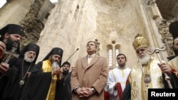 Georgian Patriarch Ilia II (right) blesses Mikheil Saakashvili (center) in the 11th-century Bagrati Cathedral after the latter's reelection as president in 2008.