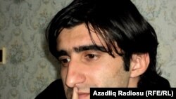 "Azadlig" reporter Ramin Deko says he was warned to stop his opposition activities.