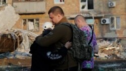 Preživeli ruskog napada na Kijev pokušavaju da se izbore sa posledicama Preživeli ruskog napada na Kijev pokušavaju da se izbore sa posledicama