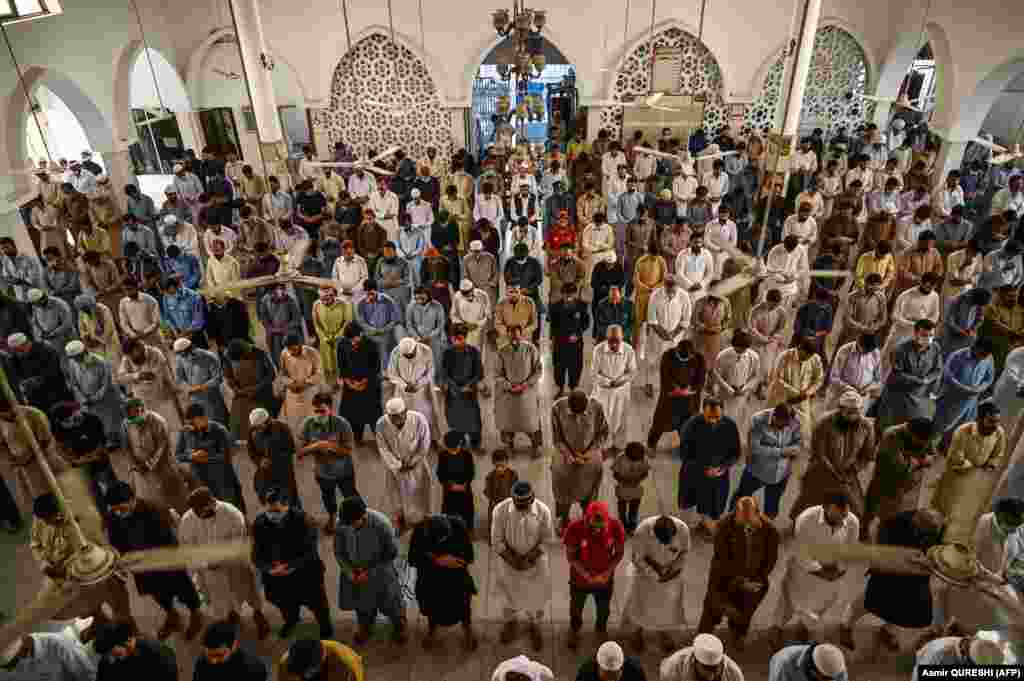 No physical distancing and very few masks as devotees gather at this mosque in the Pakistani capital, Islamabad, on May 22. They are among some 1.8 billion Muslims who celebrate Eid al-Fitr around the world.