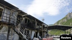 A burned-out Kosovo police border post, which was attacked by members of the region's Serbian minority last week.