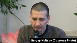 Дмитрий Угай во время чтения лекции про йогу