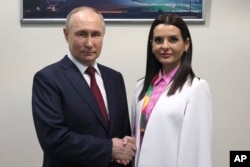 Очільник Росії Путін і башкан Гагаузії Євгенія Гуцул. Сочі, Росія. 6 березня 2024 року