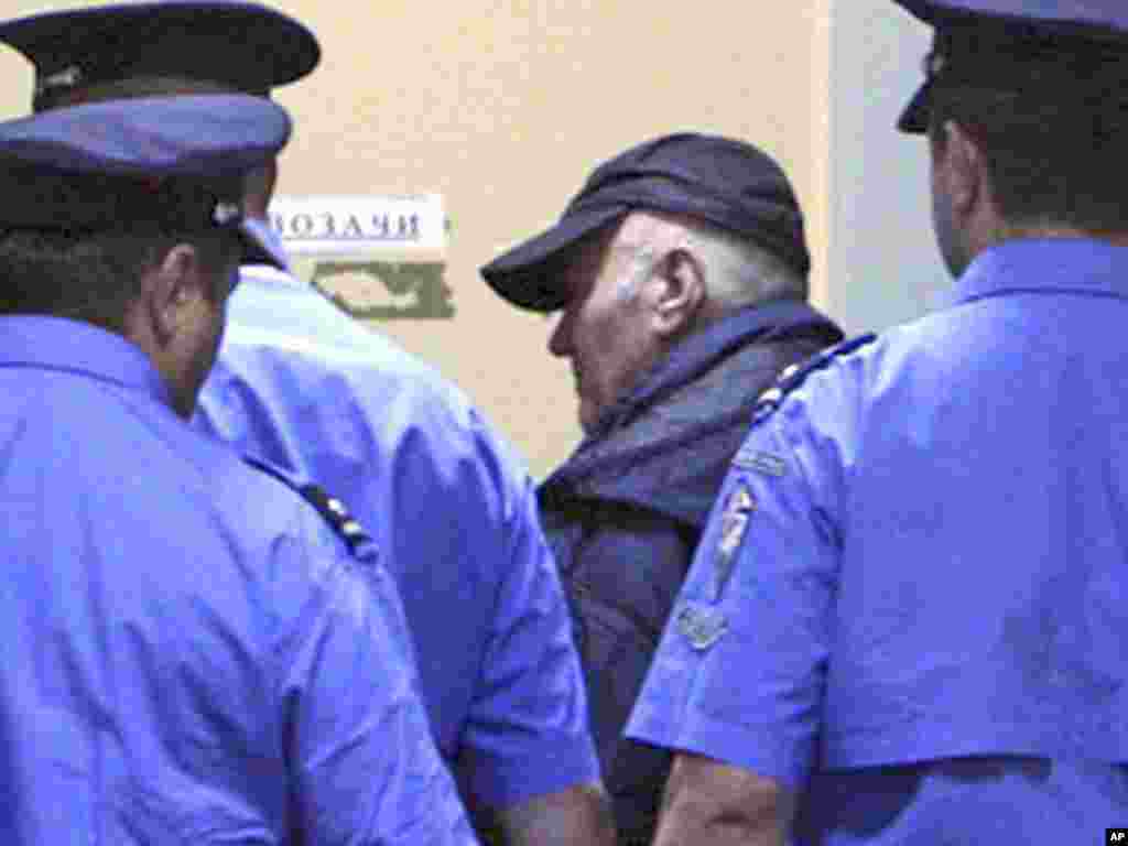 A handout image released by the Serbian government on May 26 of a 69-year-old Ratko Mladic entering a court in Belgrade in police custody. AP photo/Serbian Government