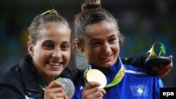 Одетта Ҷуффрида ва Маҷлинда Келмендӣ