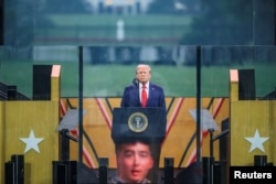 Президент Трамп на военном параде в Вашингтоне 14 июня