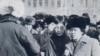 Pro-democracy leader Sanjaasuren Zorig (center, with glasses) and Tsakhiagiin Elbegdorj, the current president of Mongolia, standing on Ulan Bator's central Sukhbaatar Square during the 1990 demonstrations.