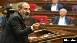 Armenian Prime Minister Nikol Pashinian speaks to parliament on October 24.
