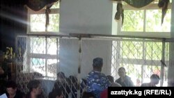 Opening of the murder trial of 10 ethnic Uzbeks charged with killing a police cheif and his driver during the June 2010 violence.