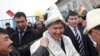 Kyrgyzstan's President-elect Almazbek Atambaev (centre) on the campaign trail last month. 