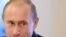 Russian Prime Minister Vladimr Putin -- soon to be banging his shoe?
