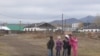 Mongolian children walk home from school in Zuunkharaa, a former railroad and industrial hub 160 kilometers from the capital, Ulan Bator.