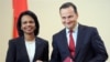 Rice and Polish Foreign Minister Sikorski after signing the deal