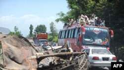 A convoy of local residents flee from the Naway Kalay area of Swat valley
