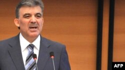 Turkish President Abdullah Gul addresses the parliament in Bishkek