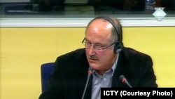 Momir Stojanović kao svedok odbrane na suđenju načelniku Resora javne bezbednosti MUP-a Vlastimiru Đorđeviću u Hagu, februar 2010.