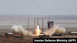 A Simorgh (Phoenix) satellite rocket is launched at an undisclosed location in Iran in July 2017.
