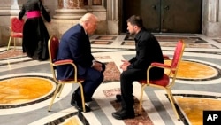 Ukrainian President Volodymyr Zelenskyy (right) and US President Donald Trump speak before the funeral of Pope Francis on April 26.