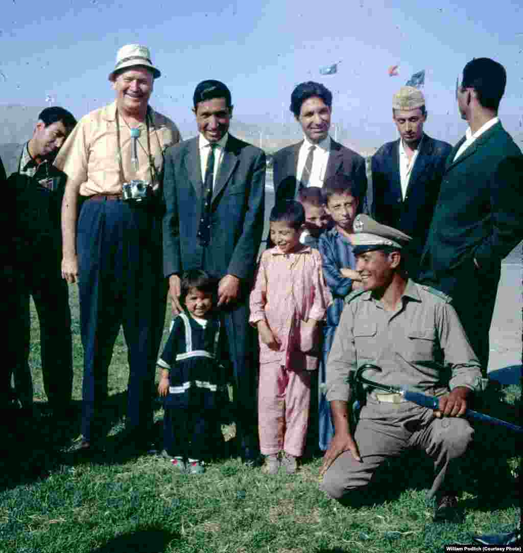 Of her father, Dr. William Podlich (second from left), Peg Podlich said: &quot;He had always said that since he had served in WWII...he wanted to serve in the cause of peace. In 1967, he was hired by UNESCO as an expert on principles of education for a two-year stint in Kabul.... Throughout his adult life, because he was interested in social studies, whenever he traveled around [in Arizona, to Mexico, and other places] he continued to take pictures. In Afghanistan he took half-frame color slides [on Kodachrome] and I believe he used a small Olympus camera.&quot;