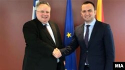 Macedonian Deputy Prime Minister Bujar Osmani (right) with Greek Foreign Minister Nikos Kotzias in Athens.