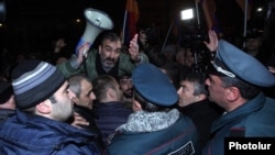 Armenia - Opposition leader Zhirayr Sefilian appeals to riot police as they clash with protesters in Yerevan, 1Dec2015.